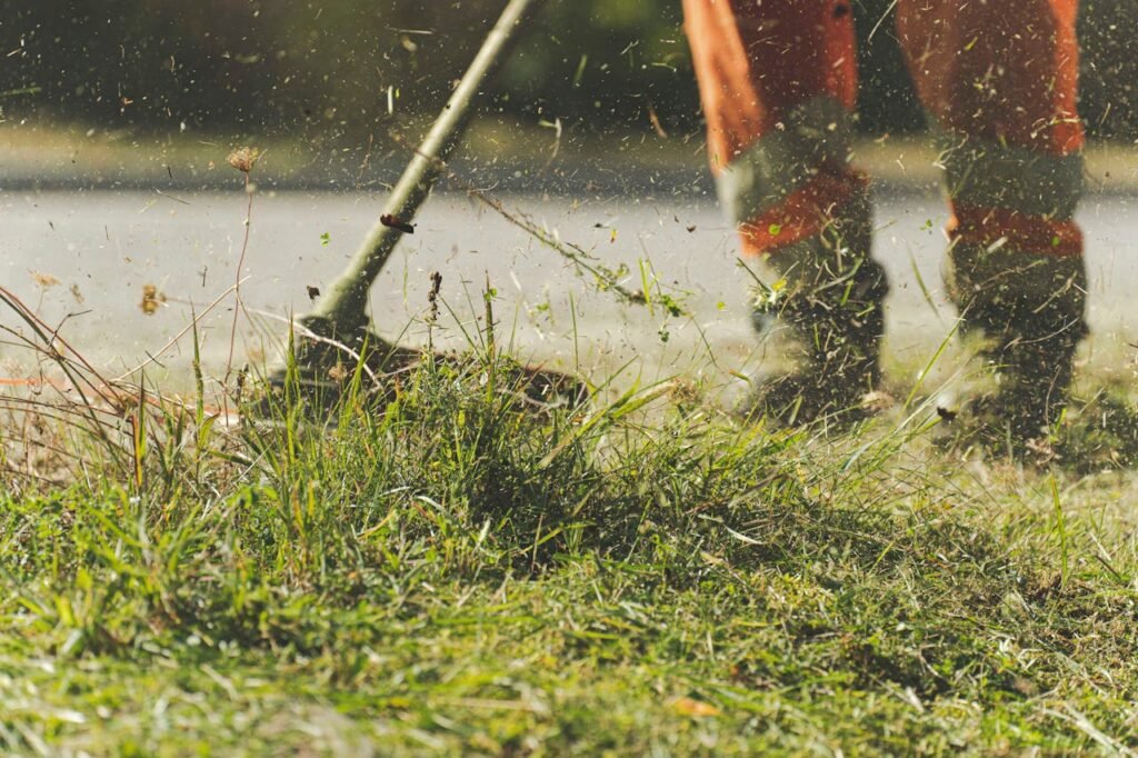 pexels-photo-11364122 Person Using Lawn Mower