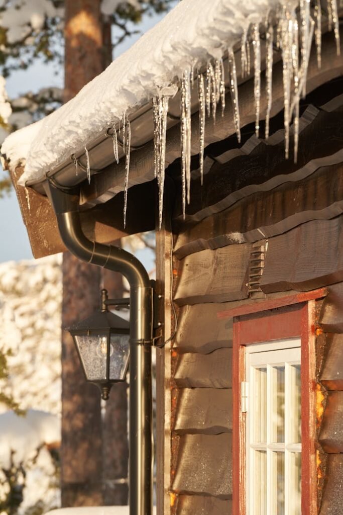 pexels-photo-8875446 Icicles Hanging from a Gutter